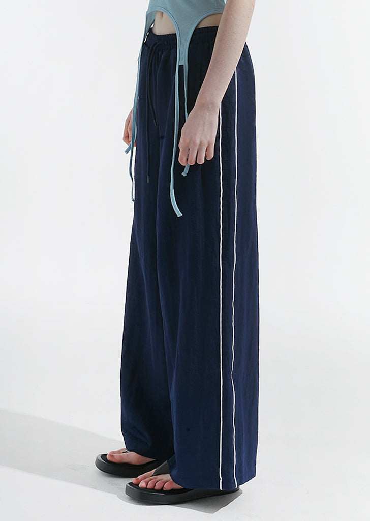 saysra-ss-24-satin-track-pants-navy