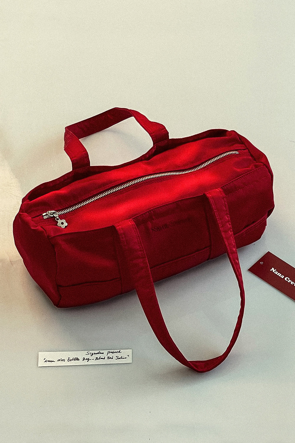 nana-crew-ss-24-nana-mini-duffle-bag-blood-red-satin